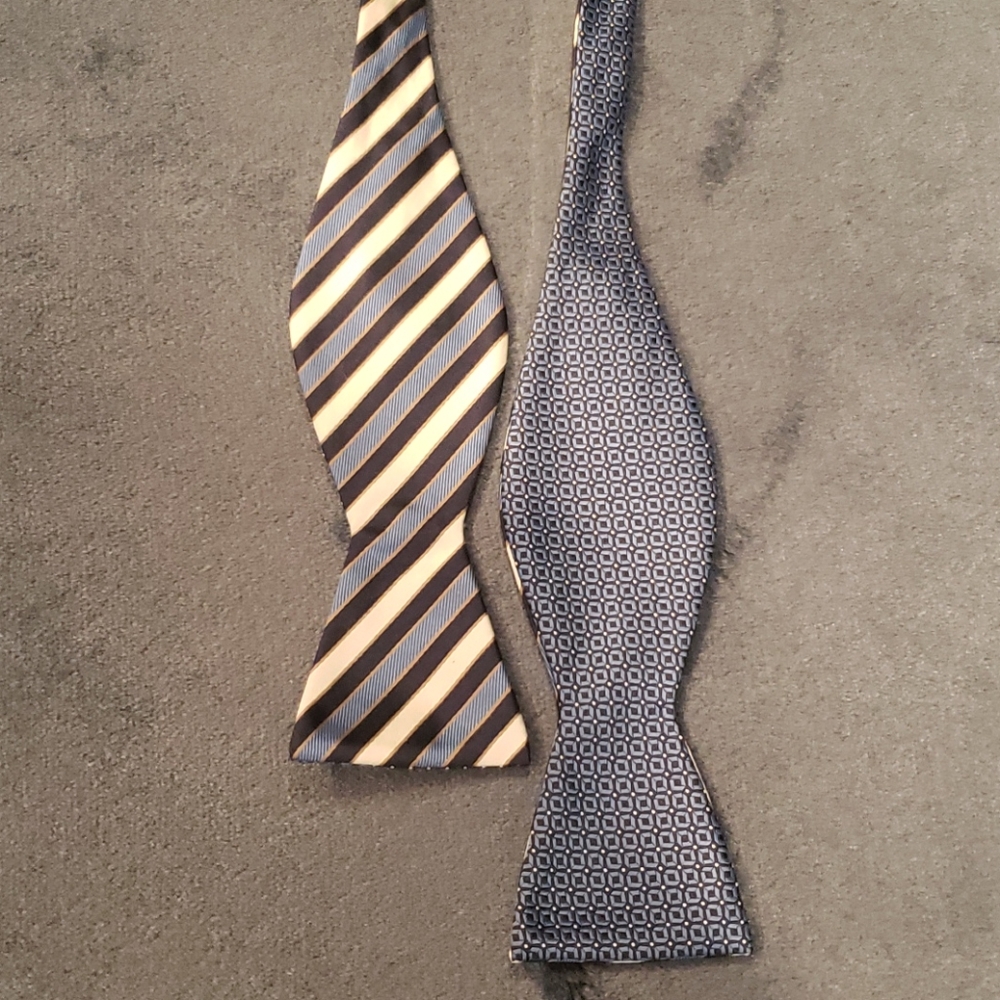 Adjustable two sided blue and white satin bow tie.